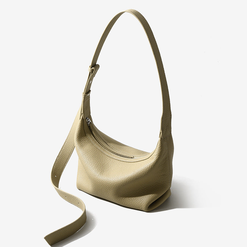 Genuine First Layer Cowhide Dumpling Bag Versatile and Unique Shoulder and Crossbody Design for a Luxe Feel