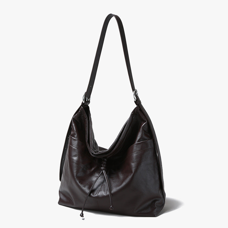 Genuine Leather Women's Tote Bag Luxe Grain Cowhide Shoulder Bag with Bow and Tassel Detail Spacious Commuter Handbag for Everyday Elegance