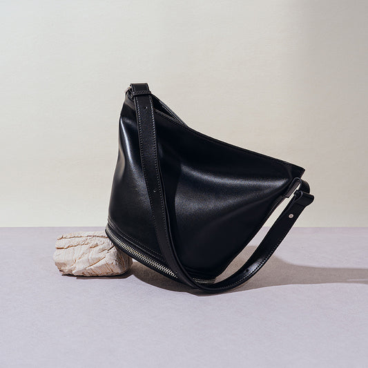 Leather Bucket Bag with Unique Design, Large Capacity for Commuting, Versatile Crossbody Shoulder Bag