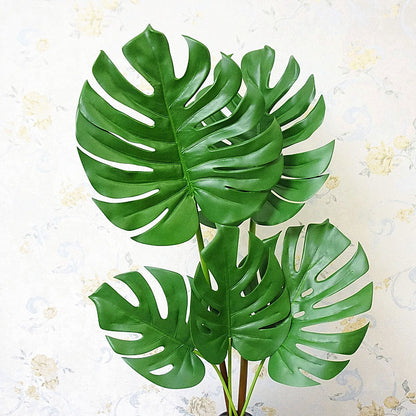 Charming Nordic-Inspired Faux Plants: Delicate Small Monstera Leaves for Stunning Decorative Floral Arrangements and Lush Greenery Backdrops