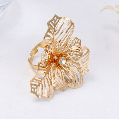 Bohemian Vintage Hollow Metal Big Flower Adjustable Ring for Women - Elegant and Casual Design Perfect for Any Occasion