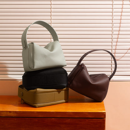 Versatile Genuine Leather Crossbody Bag for Everyday Commute Chic Minimalist Design Elegant Handheld Style Women's Accessory