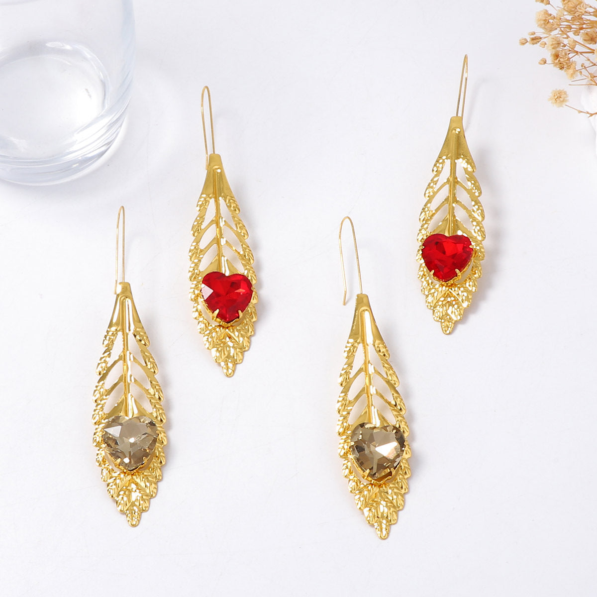 Luxurious Vintage-Inspired Statement Earrings with Intricate Metal Filigree and Exaggerated Feather Leaf Design – Perfect for Glamorous Parties and Special Occasions