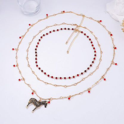 Chic Layered Beaded Chain Necklace with Alluring Zebra Pendant – Stylish and Affordable Luxury Design for Fashion-Forward Women