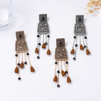 Elegant Retro Bohemian-Style Long Tassel Pendant Earrings with Geometric Floral Alloy Elements – Perfect for Any Occasion