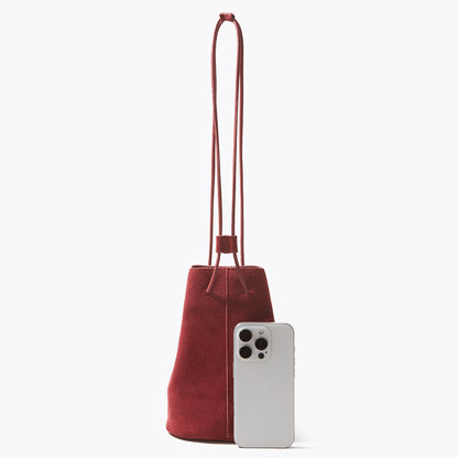 High Gloss Pebbled Cowhide Leather Mini Bucket Bag for Women Chic Vintage Inspired Design for Commute Versatile Shoulder and Handheld Style