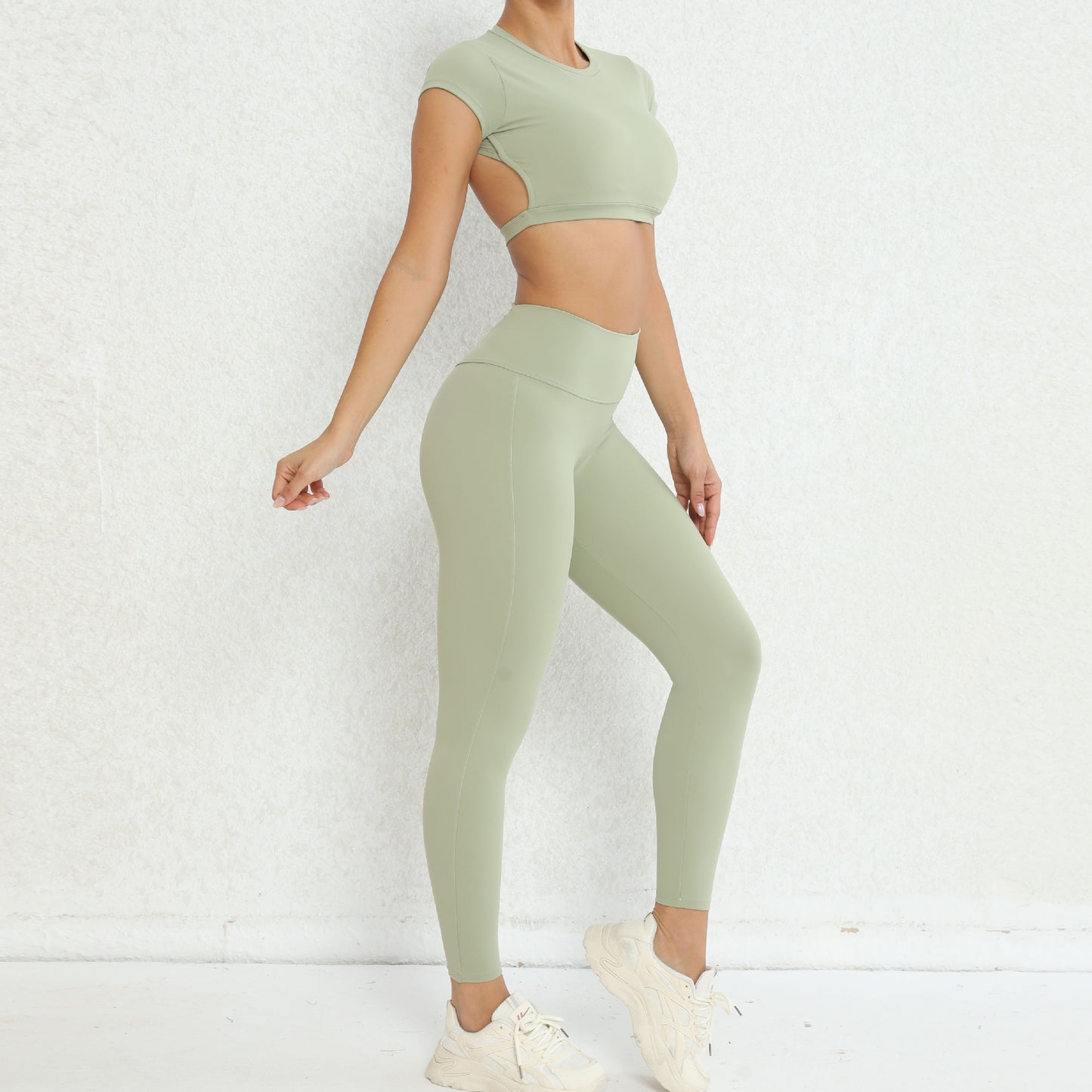 Hollow Back Yoga Set for Women Sporty Workout Ensemble with Built in Bra and High Waisted Leggings for Comfort and Flexibility