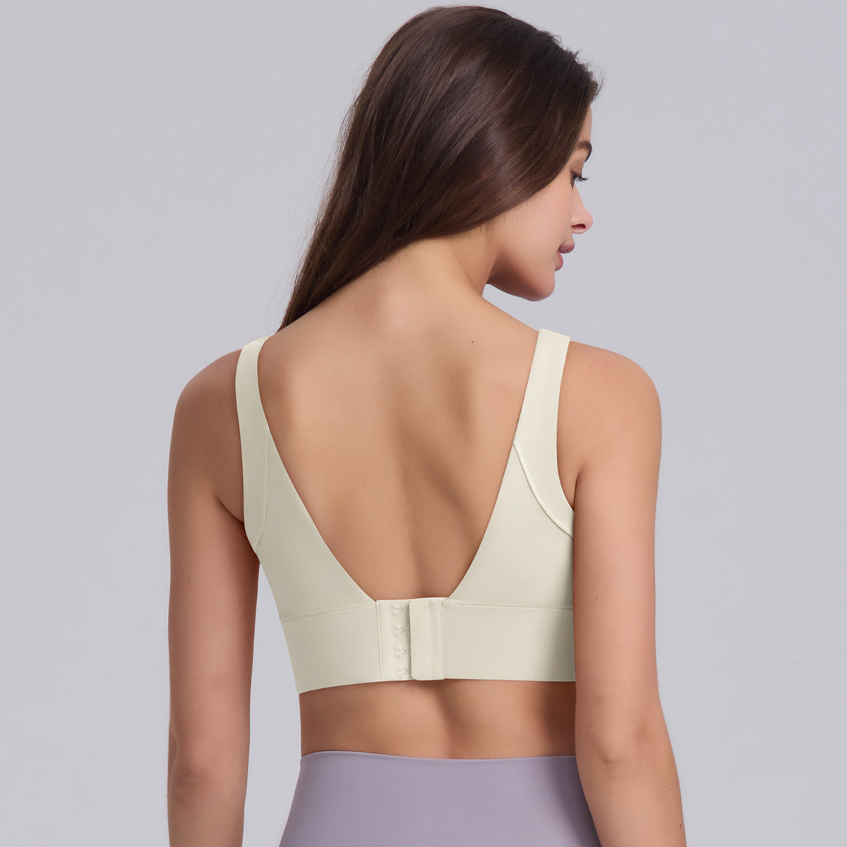 Solid Color Hollow Back Sports Bra with Button Closure for Pilates Yoga Running and Gym Workouts