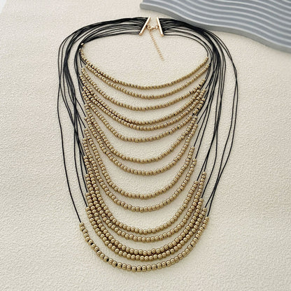 Hip Hop Punk Inspired Multi-Layered Gold Beaded Necklace - Unique Creative Design for Stylish Women - Bold Casual Statement Piece