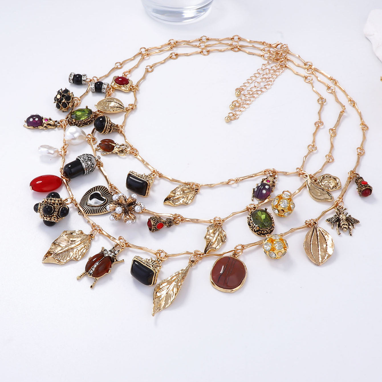 Vintage-Inspired Layered Pendant Necklace Featuring Unique Insect, Leaf, Heart, and Geometric Designs - Perfect for Adding a Touch of Bohemian Charm to Any Outfit