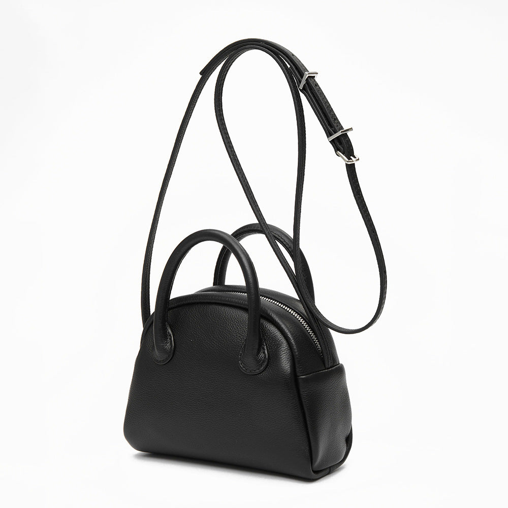 Grain Leather Korean Inspired Bowling Bag Shell Design Versatile Handheld Crossbody Carry Luxurious Genuine Leather Small Purse for Fashion Forward Individuals
