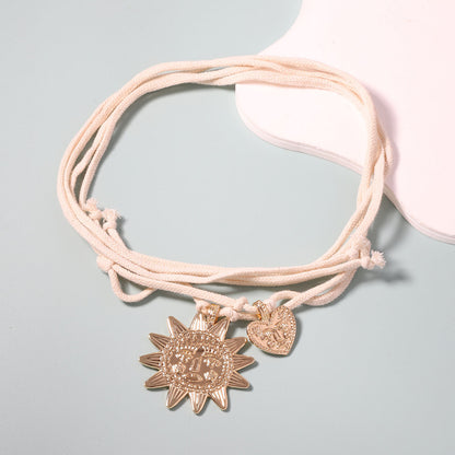 Stylish Casual Alloy Heart-Shaped Sun Pendant Necklace - Long Layered Design for Effortless Versatility