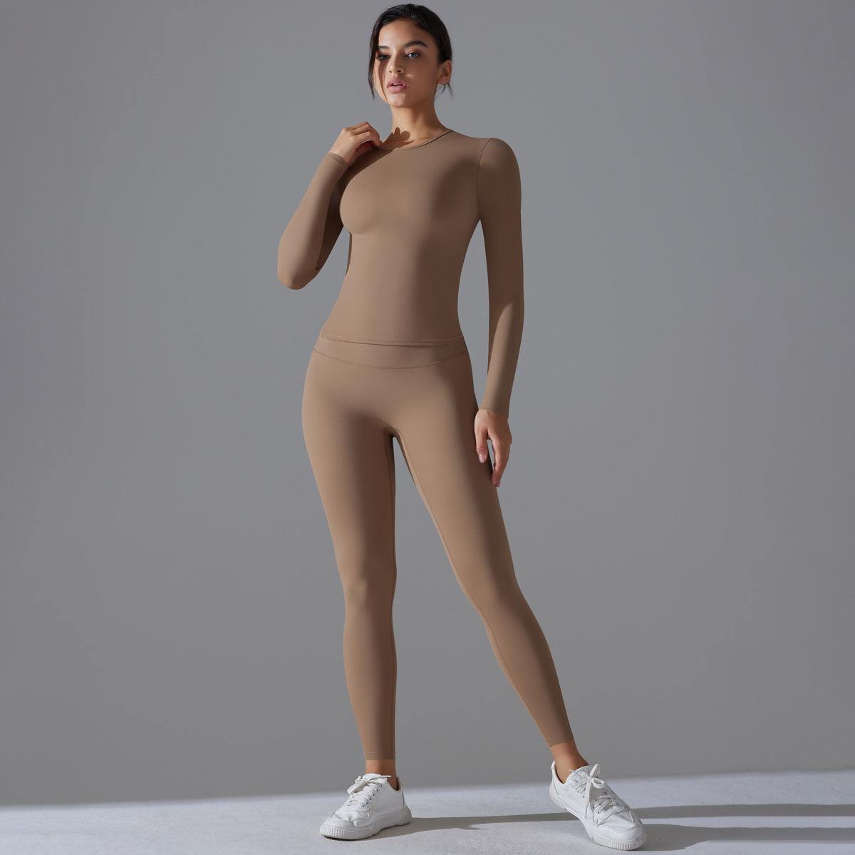 High Waisted Long Sleeve Yoga Set with Fitted Round Neck and Sculpting Leggings for Comfort and Style