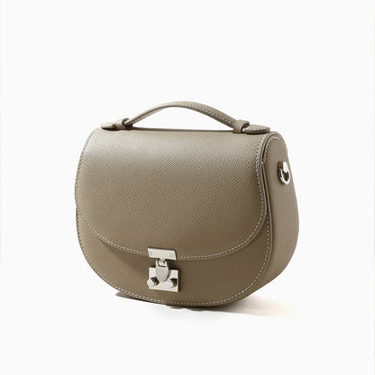 Spring Collection Genuine Leather Women's Handbag Minimalist Cowhide Tote with Unique Design Versatile Crossbody Bag for Commuting and Everyday Use