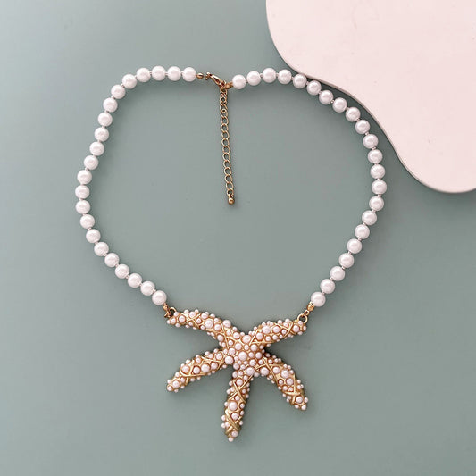 Unique Creative Alloy Starfish Pendant Necklace with Faux Pearl Beads - Perfect for Vacation Style and Summer Fashion