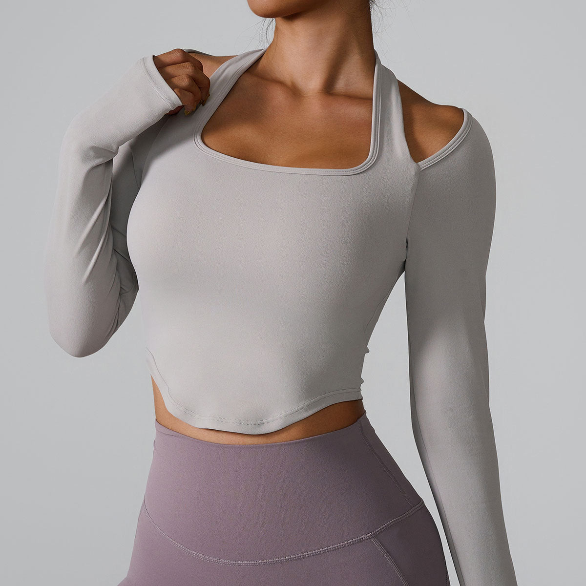 Long Sleeve High Neck Yoga Top for Women Form Fitting Quick Dry Fabric with Built In Bra Support for Comfort During Workouts