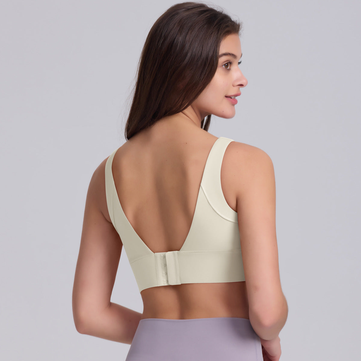 Solid Color Hollow Back Sports Bra with Button Closure for Pilates Yoga Running and Gym Workouts