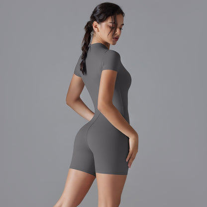 All in One Yoga Outfit with Stand Up Collar and Half Zip Short Sleeve Bodysuit for Fitness Form Fitting Athletic Wear for Performance