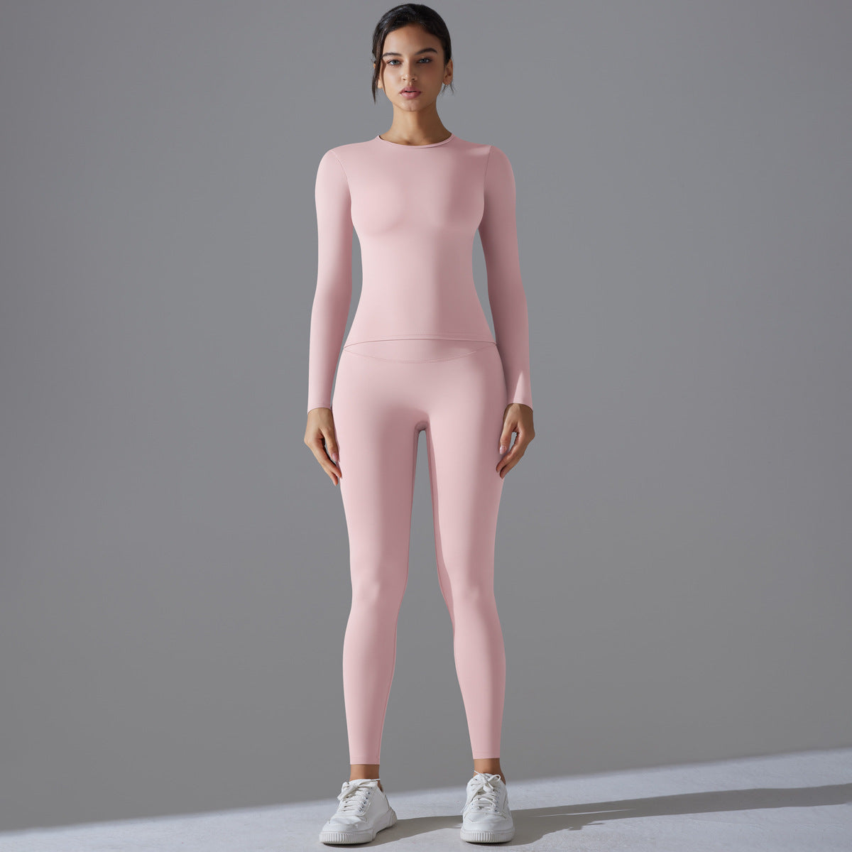 High Waisted Long Sleeve Yoga Set with Fitted Round Neck and Sculpting Leggings for Comfort and Style