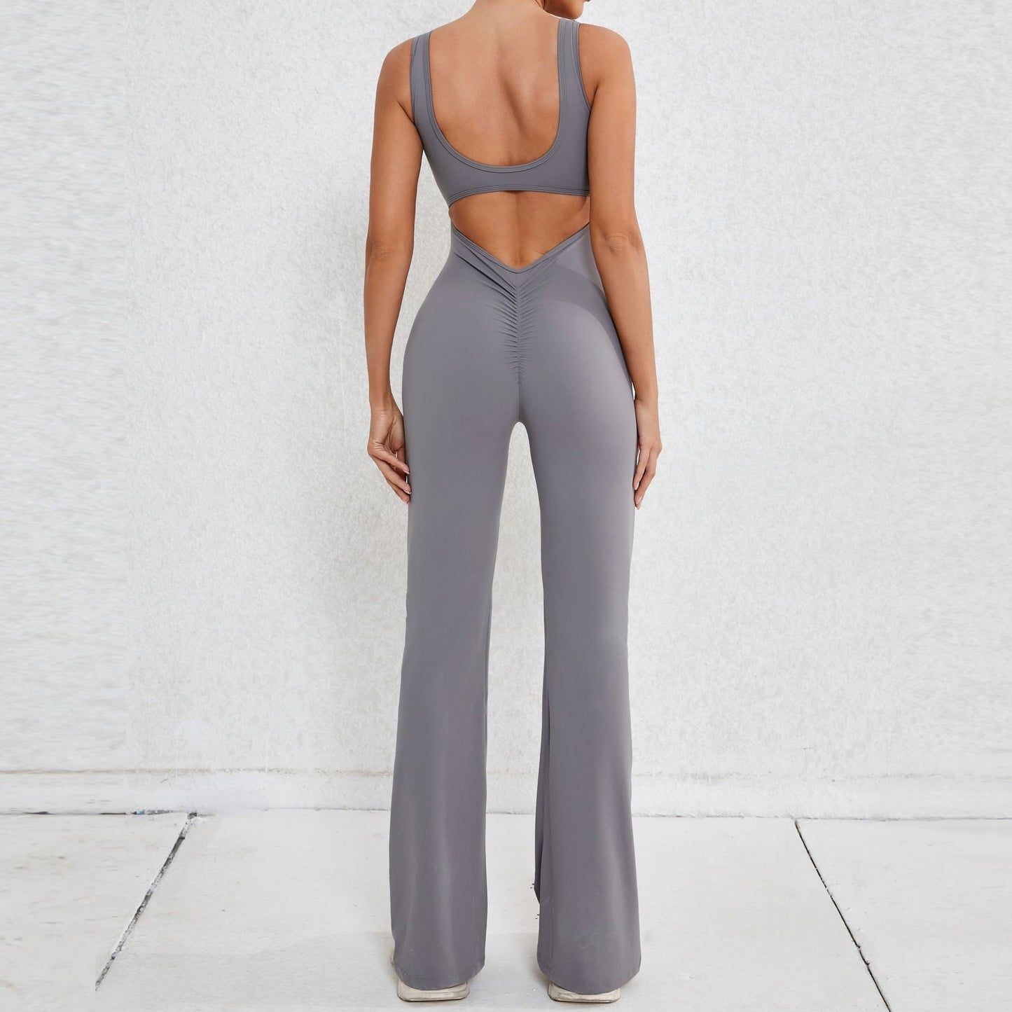 Elevate Your Workout with Our Hollow Back Peach Lift Jumpsuit Flare Leg Yoga Bodysuit for Comfort and Performance