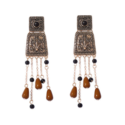Elegant Retro Bohemian-Style Long Tassel Pendant Earrings with Geometric Floral Alloy Elements – Perfect for Any Occasion