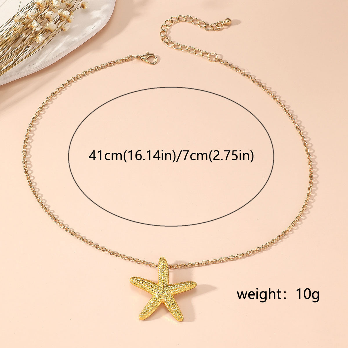 Elegant Gold Star and Pink Fish Necklace - Chic Versatile Jewelry for Every Occasion