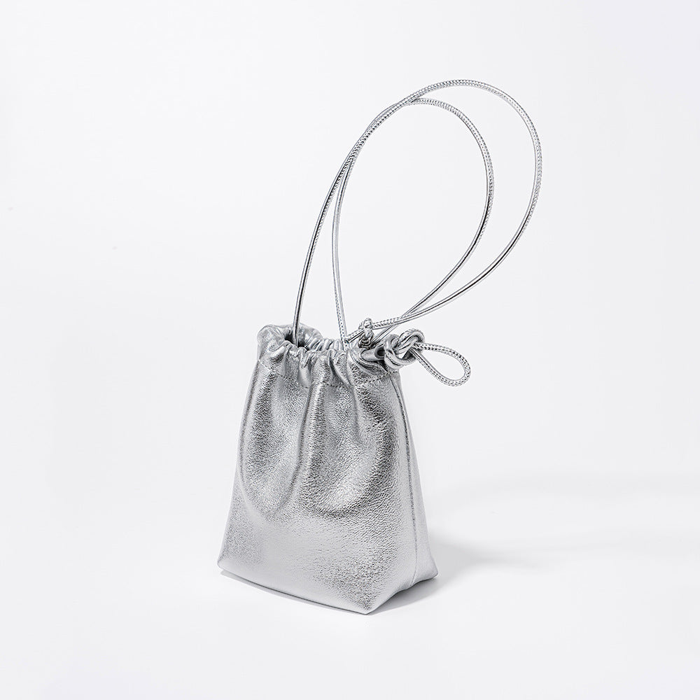 Chic Korean Mini Lambskin Bucket Bag with Soft Pleats and Drawstring Closure Silver Genuine Leather Crossbody Tote for Effortless Everyday Elegance