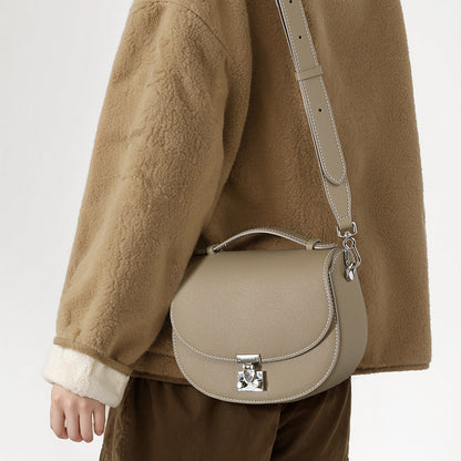 Spring Collection Genuine Leather Women's Handbag Minimalist Cowhide Tote with Unique Design Versatile Crossbody Bag for Commuting and Everyday Use