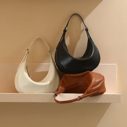 Genuine Leather Women's Bag Luxurious Vegetable Tanned Cowhide Fashion Dumpling Bag with Chic Minimalist Design for Shoulder and Crossbody Carry