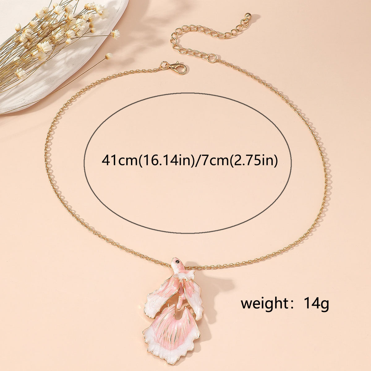 Elegant Gold Star and Pink Fish Necklace - Chic Versatile Jewelry for Every Occasion