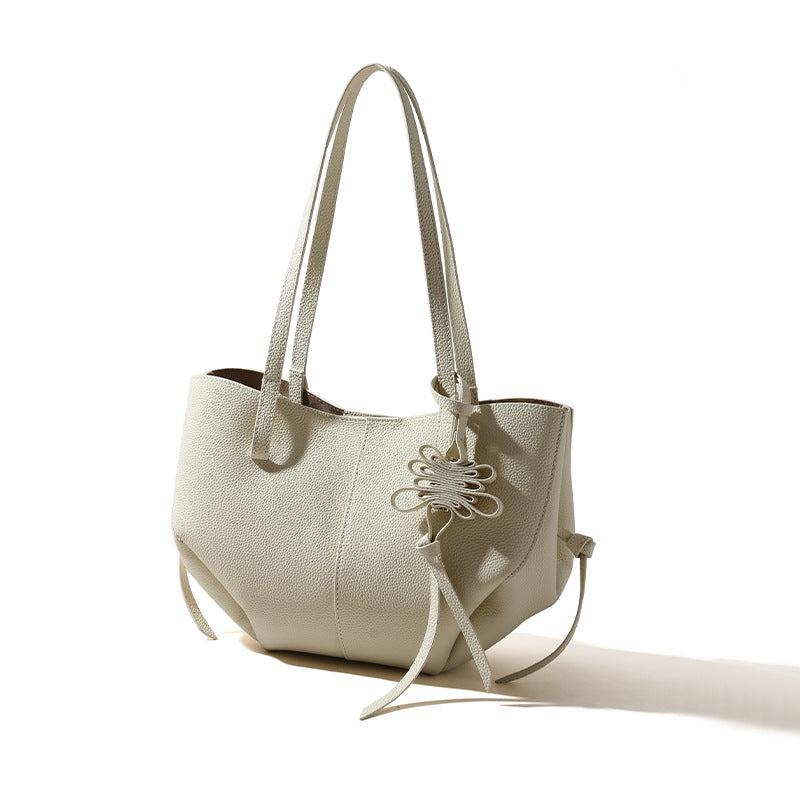 Genuine Leather Women's Tote Bag and Spacious Handbag for Daily Commute Unique Design for Work and Play