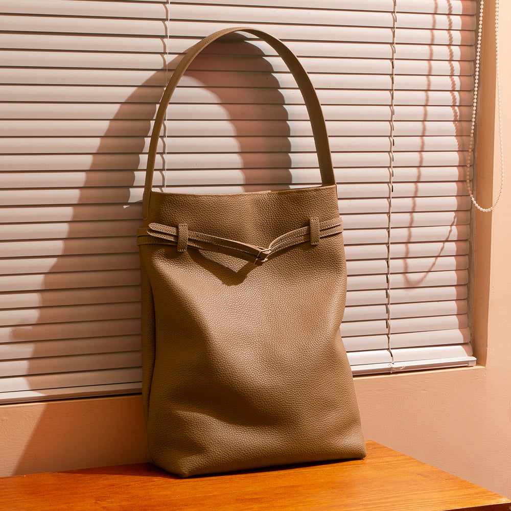 Luxury Spring Leather Handbag for Women First Layer Cowhide Tote with Unique Design Versatile Shoulder Bag and Chic Underarm Style