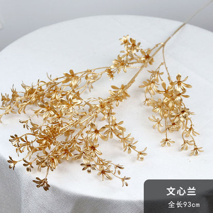 Stunning Gold Floral Arrangement with Ginkgo Leaves, Eucalyptus, and Red Berries - Perfect for New Year Celebrations and Elegant Wedding Decorations