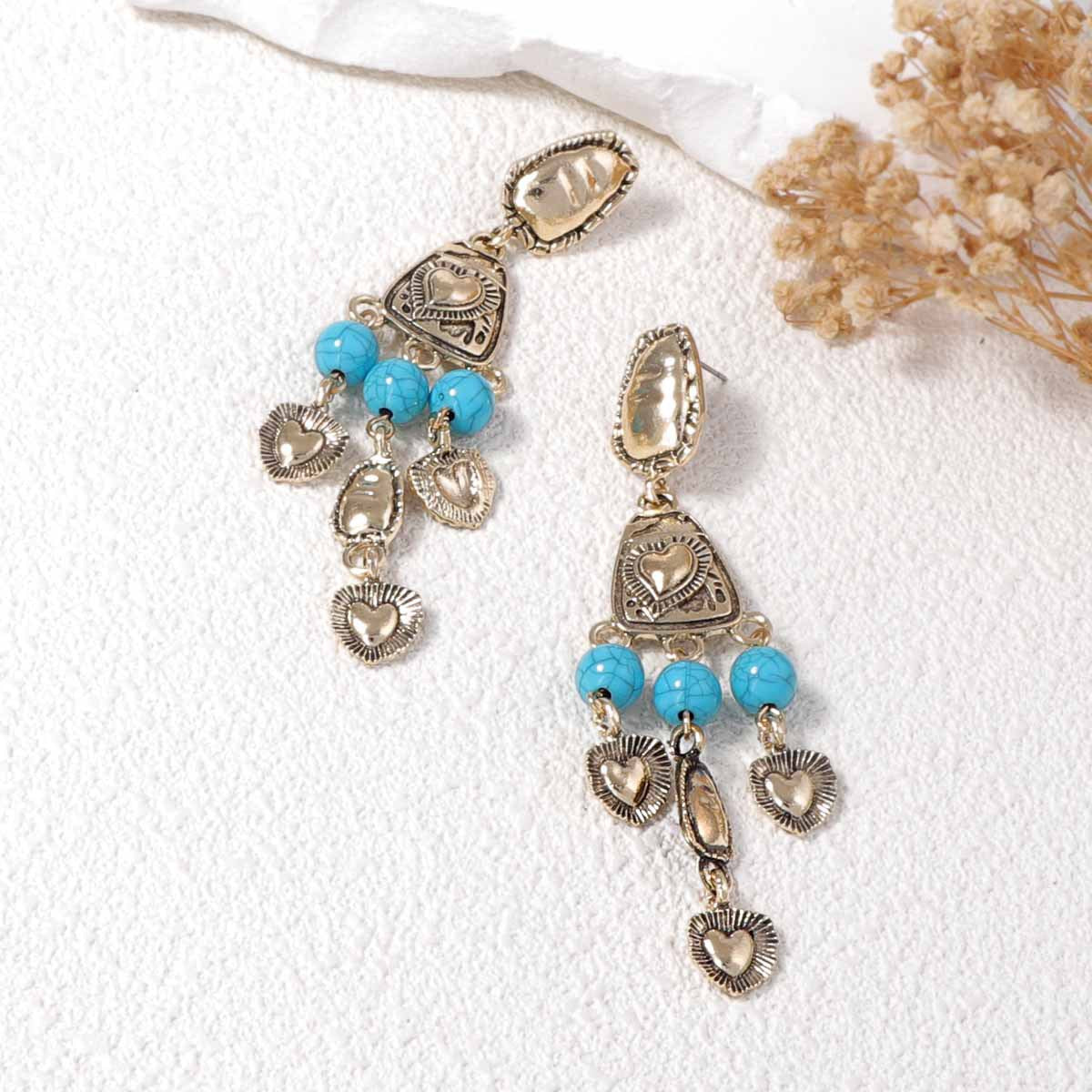 Chic Vintage Western-Inspired Irregular 3D Heart Tassel Earrings - Unique Distressed Design for Every Occasion