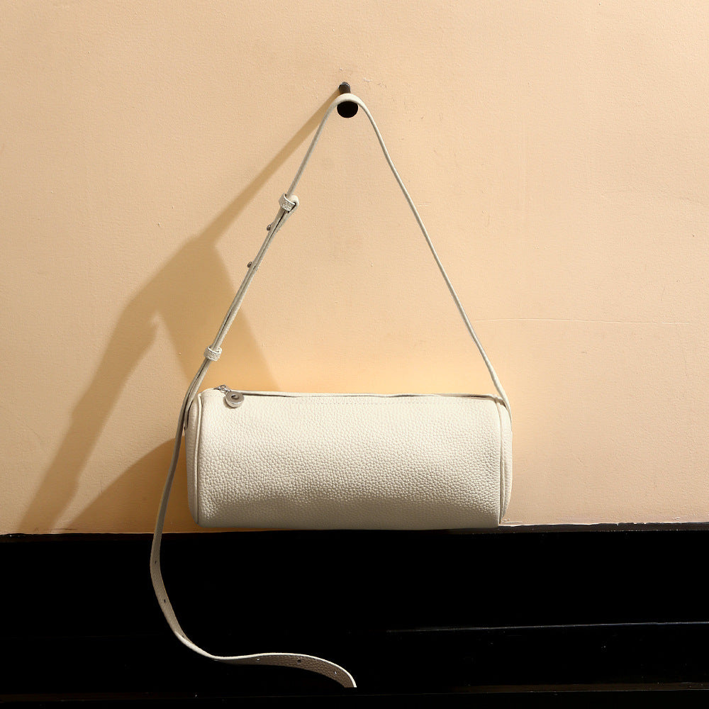 Chic Minimalist Leather Pencil Case Purse for Women Commute Friendly Cylindrical Bag with Spacious Capacity and Crossbody Design