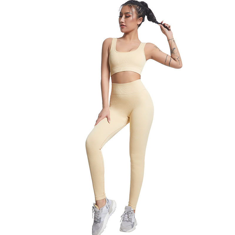 Seamless Vertical Ribbed Yoga Set for Women Moisture Wicking Slim Fit Sports Bra and Leggings for Comfort and Performance