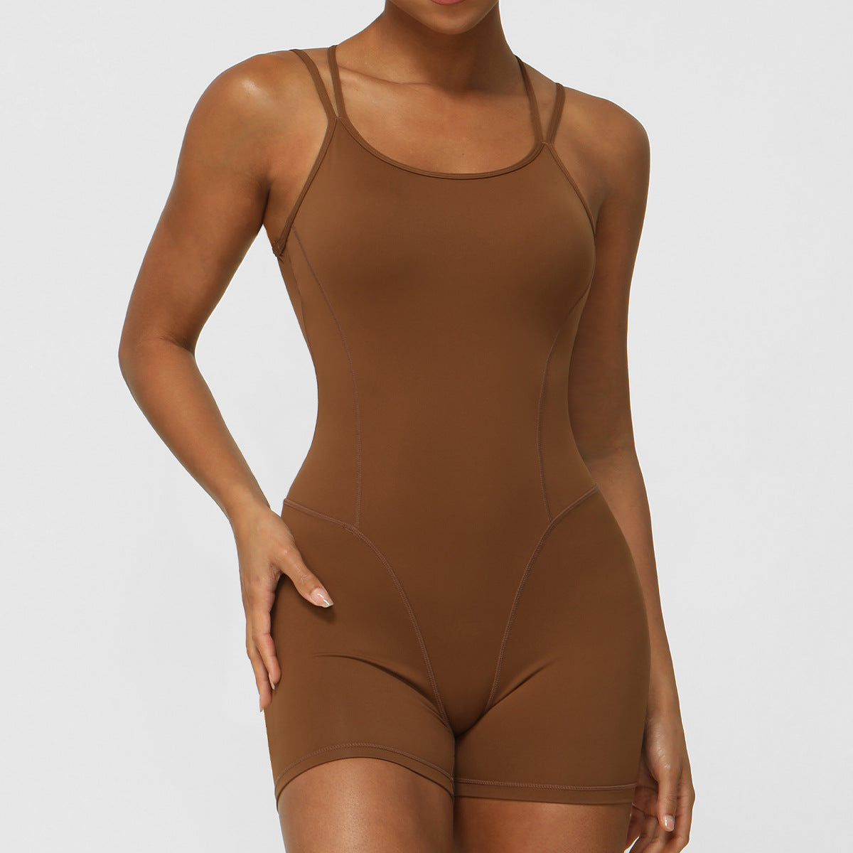 Cross Back Yoga Bodysuit for Women Sleek Strappy Design Open Back and Butt Lifting Features for Comfort and Performance