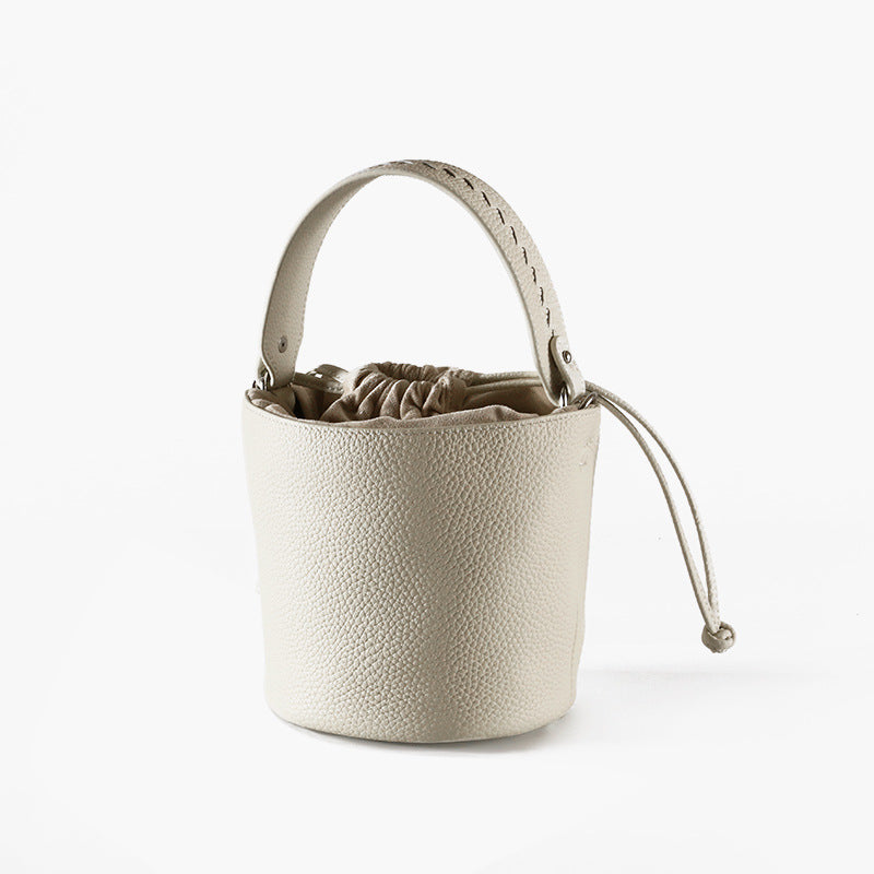 First Layer Cowhide Bucket Bag and Minimalist Design Versatile Handheld Commuter Shoulder Crossbody Bag for Everyday Elegance