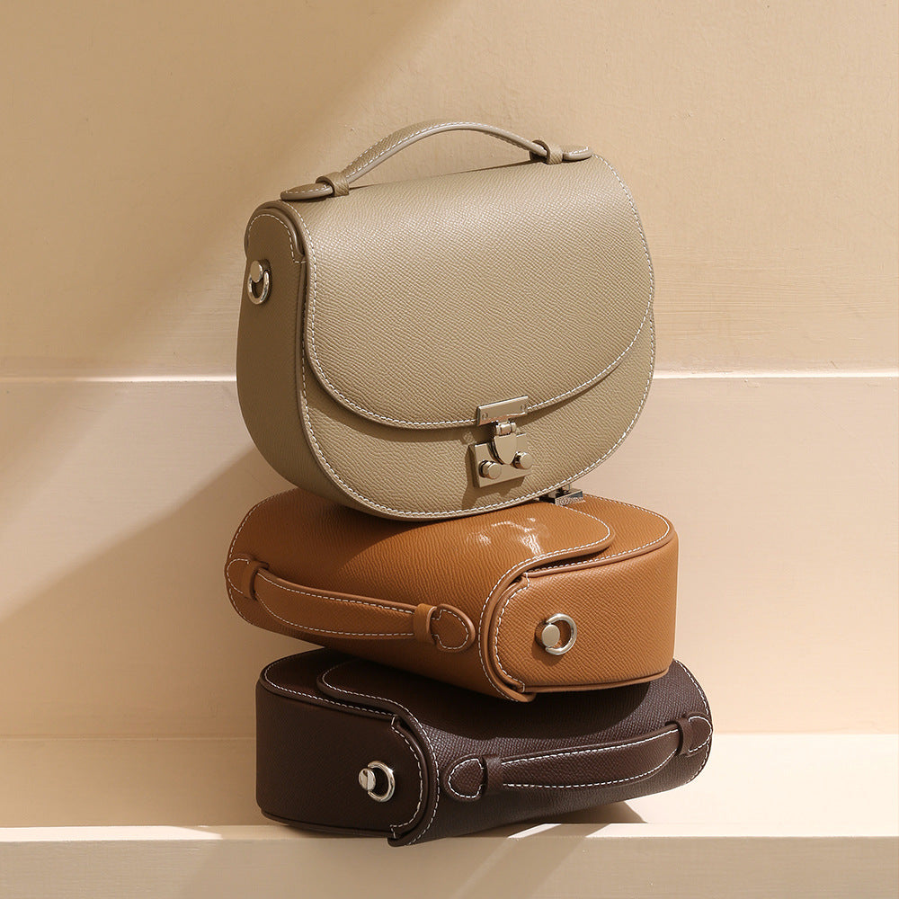 Spring Collection Genuine Leather Women's Handbag Minimalist Cowhide Tote with Unique Design Versatile Crossbody Bag for Commuting and Everyday Use