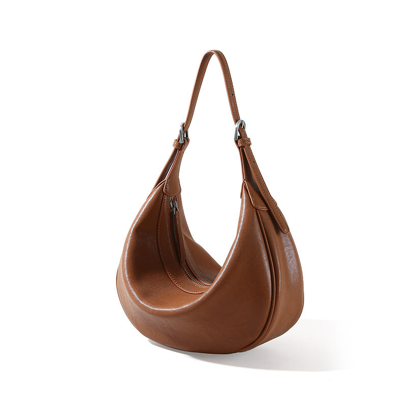 Genuine Leather Women's Bag Luxurious Vegetable Tanned Cowhide Fashion Dumpling Bag with Chic Minimalist Design for Shoulder and Crossbody Carry