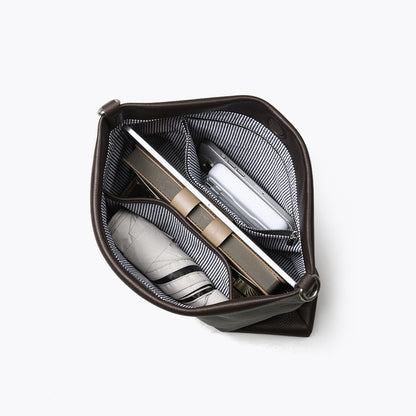 Grain Leather Minimalist Tote Bag Spacious Luxury Handbag for Women with Unique Woven Shoulder Strap for Commuting and Everyday Use