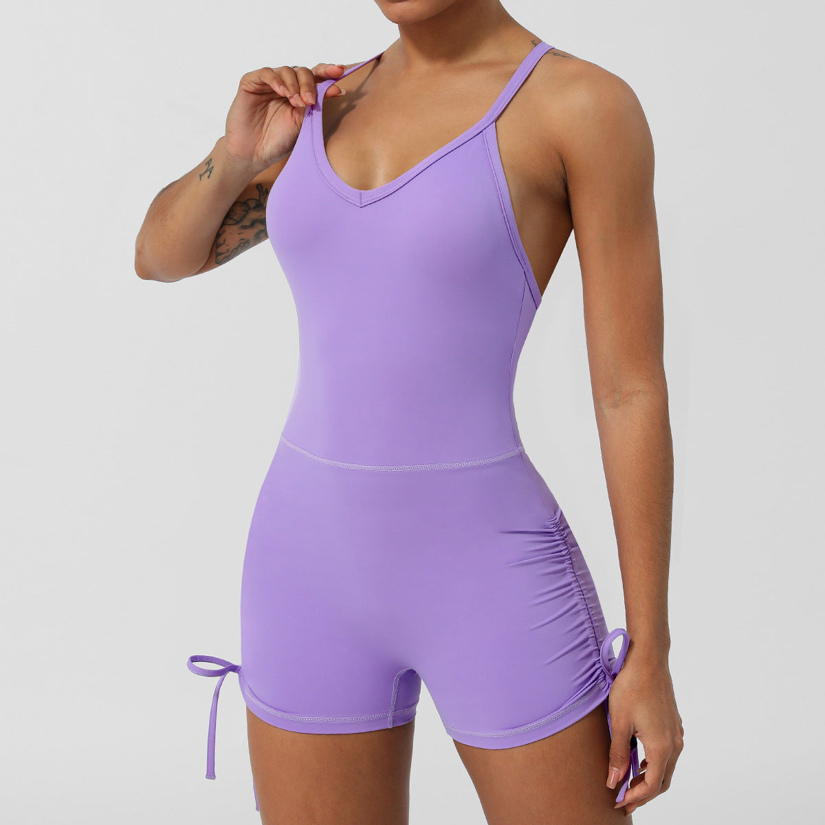 V Neck Sleeveless Yoga Romper with Cross Back Design Built in Bra Pads and Shorts for Fitness and Fashion Enthusiasts