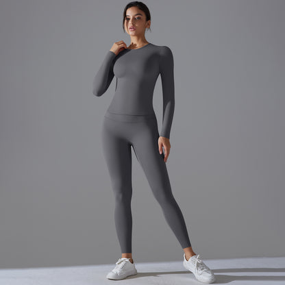 High Waisted Long Sleeve Yoga Set with Fitted Round Neck and Sculpting Leggings for Comfort and Style