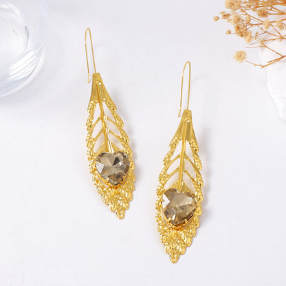 Luxurious Vintage-Inspired Statement Earrings with Intricate Metal Filigree and Exaggerated Feather Leaf Design – Perfect for Glamorous Parties and Special Occasions