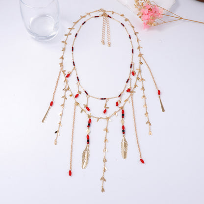 Elegant Layered Double-Strand Chain Necklace with Metal Leaf and Beaded Tassel Pendant - Perfect for Chic Women’s Fashion