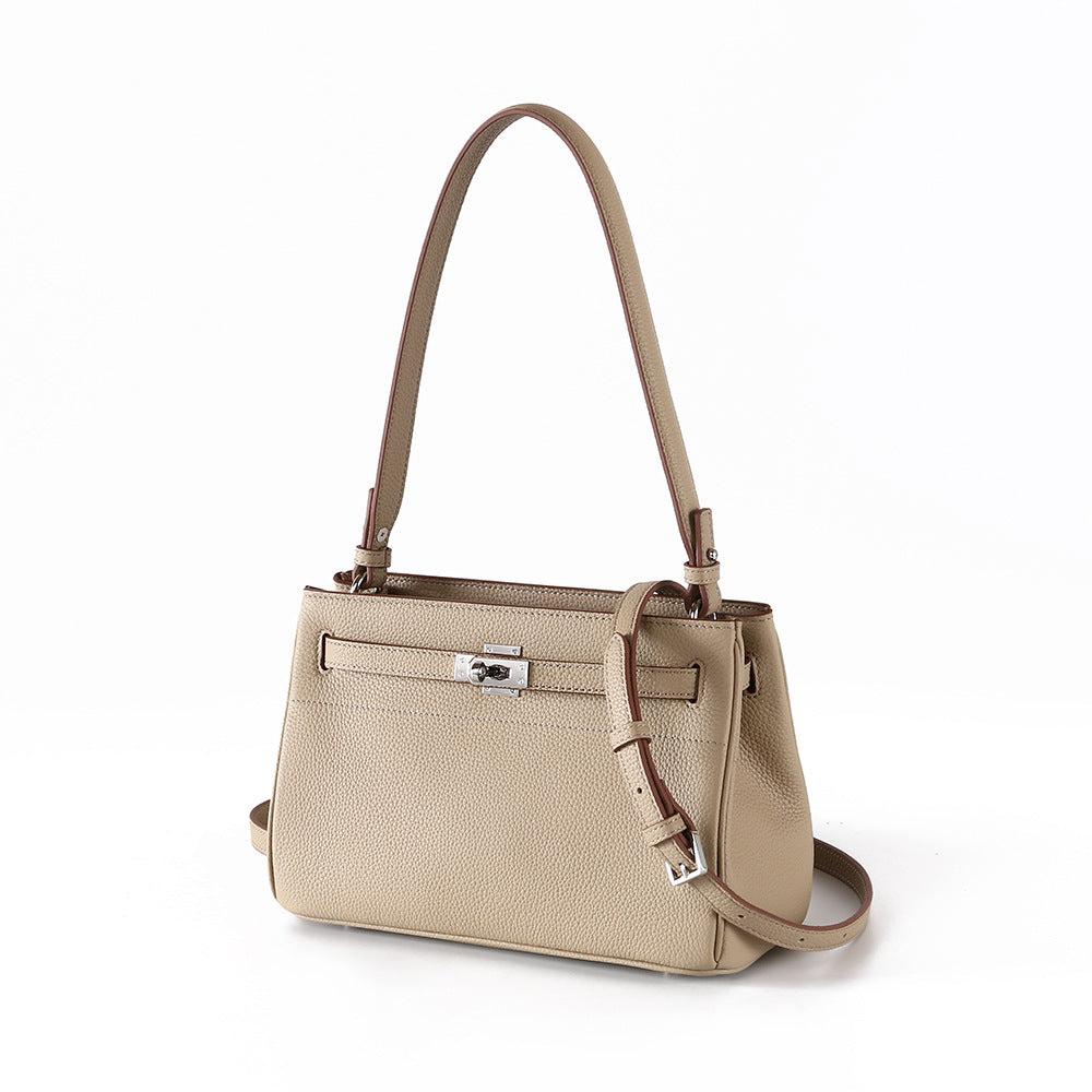 Luxurious Vintage Style Leather Tote Bag with Lock Closure Cowhide for Chic Commuting and Versatile Carrying Options