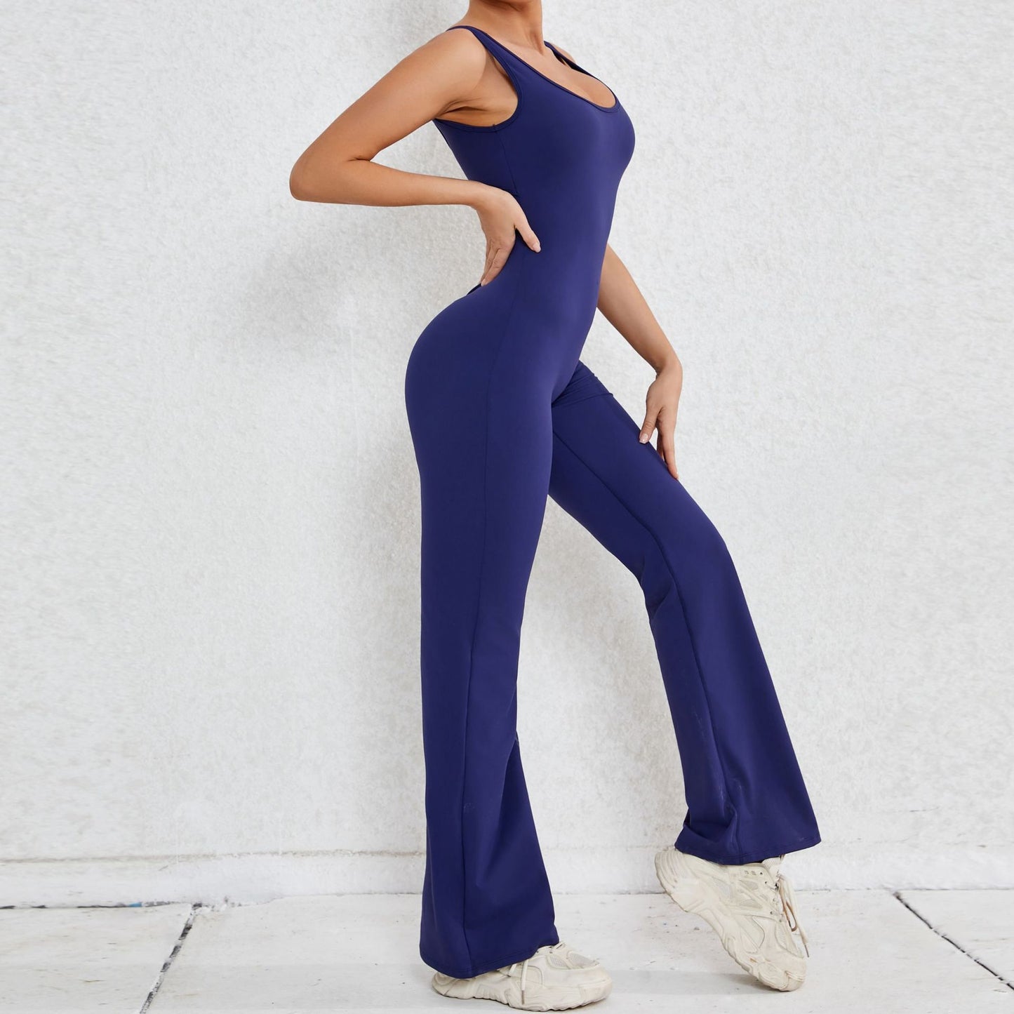 Elevate Your Workout with Our Hollow Back Peach Lift Jumpsuit Flare Leg Yoga Bodysuit for Comfort and Performance