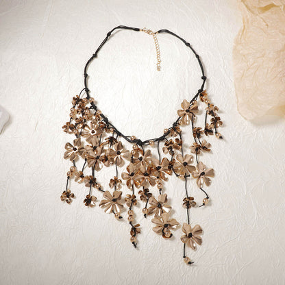 Unique Vintage-Inspired Exaggerated Metal Flower Tassel Pendant Necklace - Handmade Braided Rope Design for a Chic Boho Look
