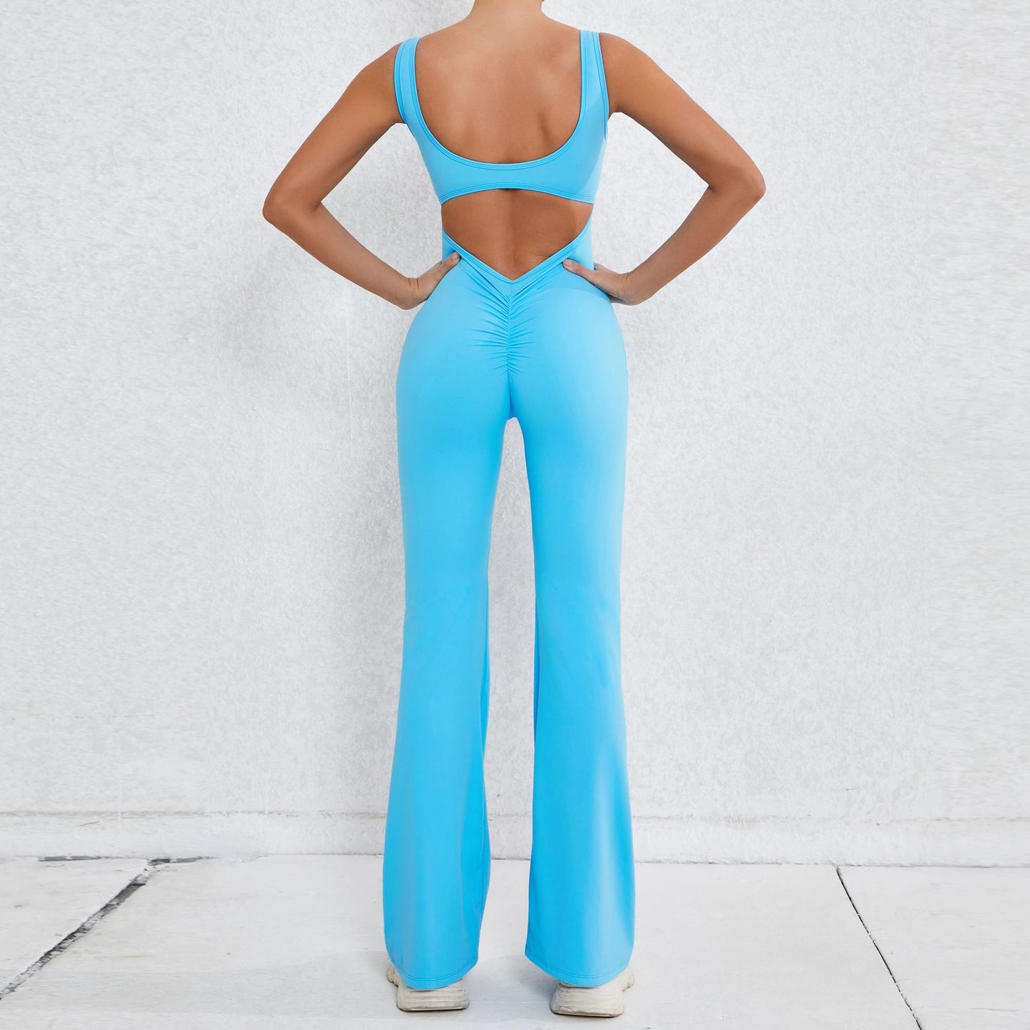 Elevate Your Workout with Our Hollow Back Peach Lift Jumpsuit Flare Leg Yoga Bodysuit for Comfort and Performance