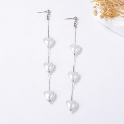 Elegant French-Style Long Pearl Heart Drop Earrings for Women - Chic and Unique Statement Piece Perfect for Parties and Special Occasions